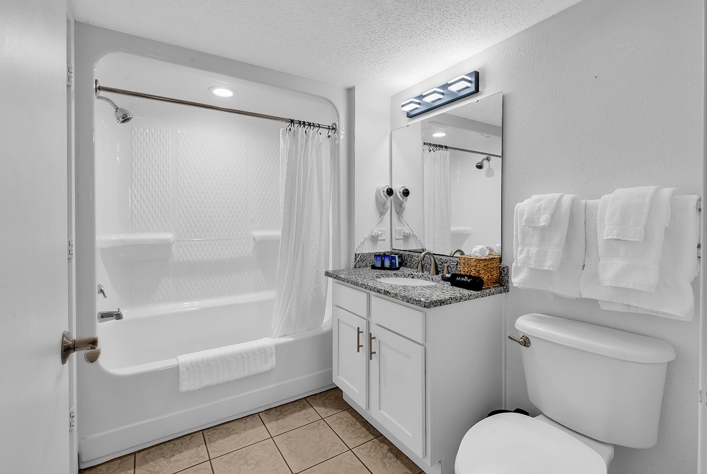 Bathroom with tub and shower
