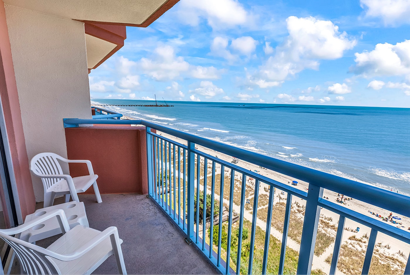 Private balcony with chairs and angled ocean view