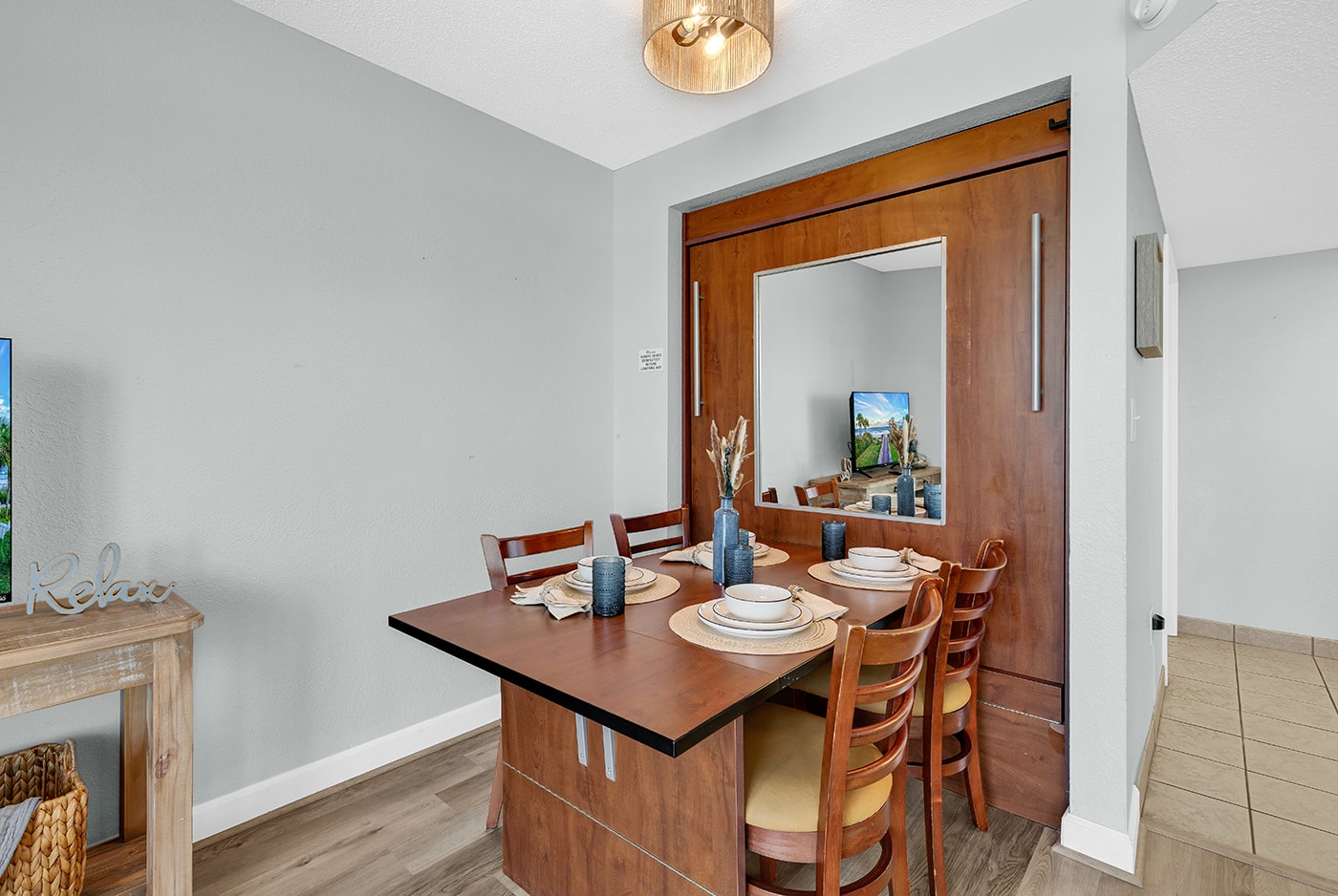 Dining area with convertible murphy bed table