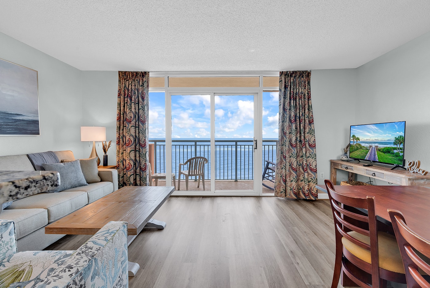 Living room with full balcony ocean view
